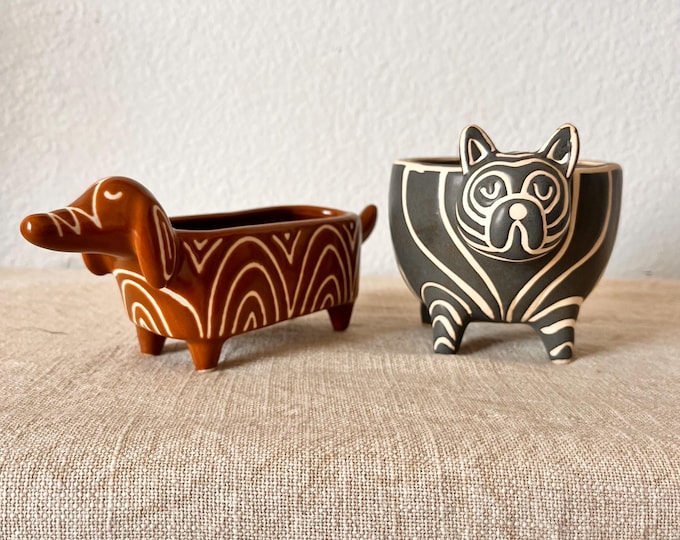 Cat and dog ceramic planter with stripes holds a 2-3 inch plant. Sold separately.