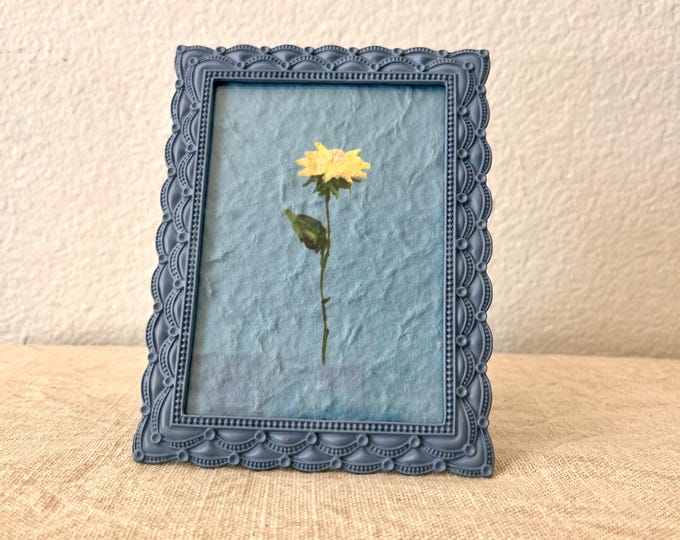 Vintage style light blue 4 1/2 x 6 inch frame holds a 3 1/2 x 5 inch image