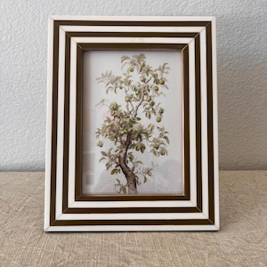 Vintage style striped frame. Stands vertically and horizontally
