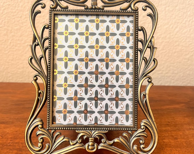 Vintage brass 6 1/2 x 5 1/2 photo frame Holds a 4 1/2 x 3 1/2 inch image