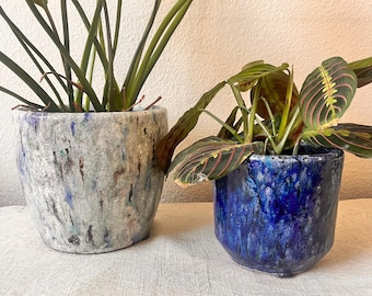 Cobalt blue reactive glaze planter 5 1/4" x4 3/4" holds a 4 inch plant. No drain hole
