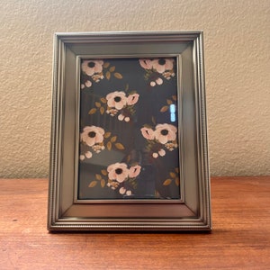 Vintage 5 x 7 silver frame with ornate detailing holds 4 1/2”x 6 1/2 image