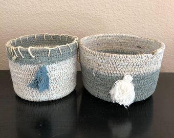 Blue and white hand woven seagrass baskets with tassels