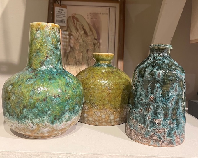 Teal colored reactive glaze vase