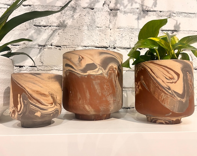 Marbled gray, brown and cream planter. Comes in two sizes