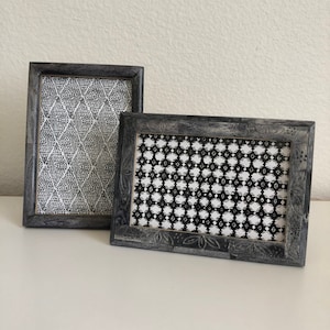 Grey 5x7 frame holds a 4x6 image