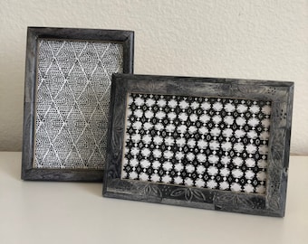 Grey 5x7 frame holds a 4x6 image