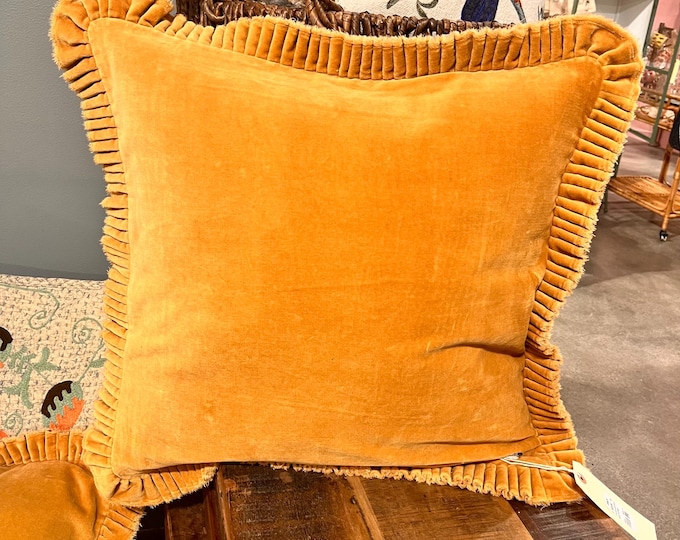 20" Square cotton mustard color velvet pillow with ruffled trim.
