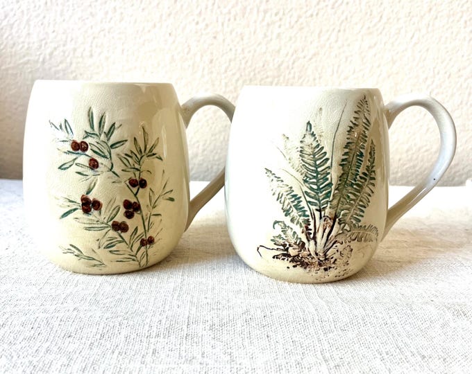 Botanical ceramic mug cream with debossed botanical leafs print, 4 styles sold seperately