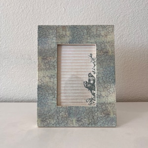 Vintage aqua and white frame 8 3/4&quot; x 6 3/4&quot; holds a 3 1/2&quot;x5&quot; image. Stands only both horizontal and vertical
