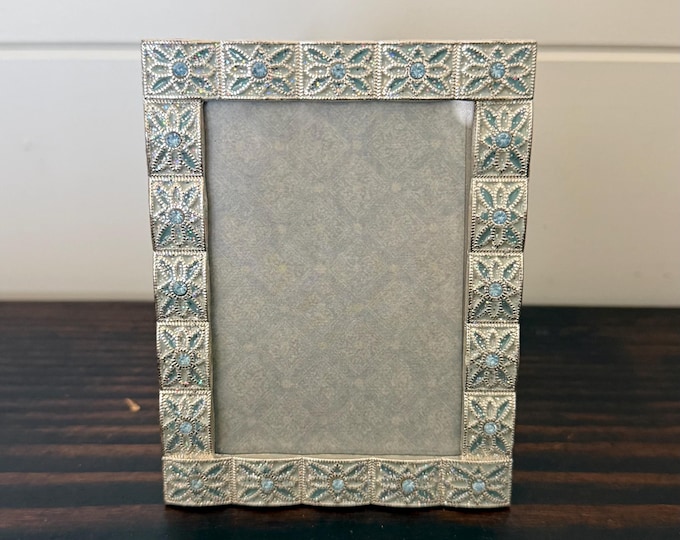 Vintage blue frame encrusted with blue jewels 3 1/2" x4" holds a 2"x3" image