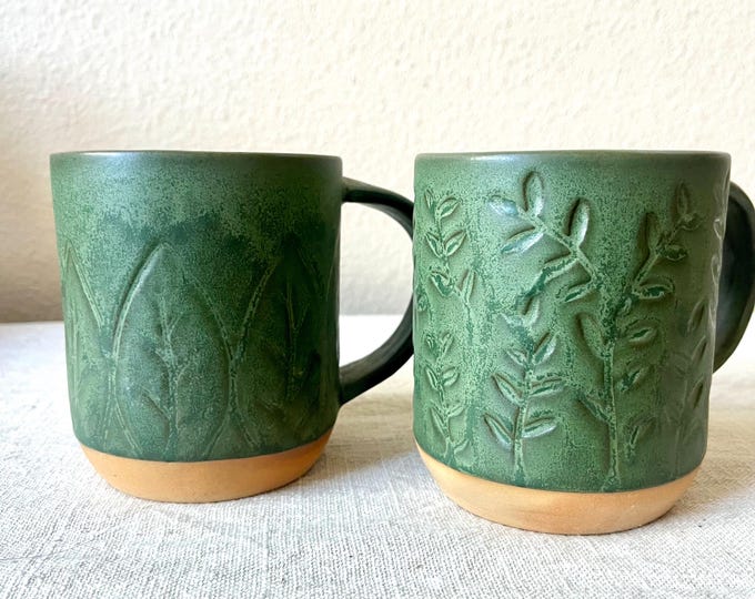 Debossed floral ceramic mug comes in two styles leaf or vine