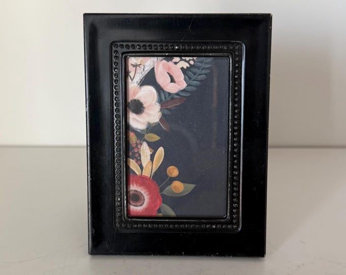 Vintage black metal 3"x 4 1/2" frame holds a  1 1/2"x 2 1/2" image