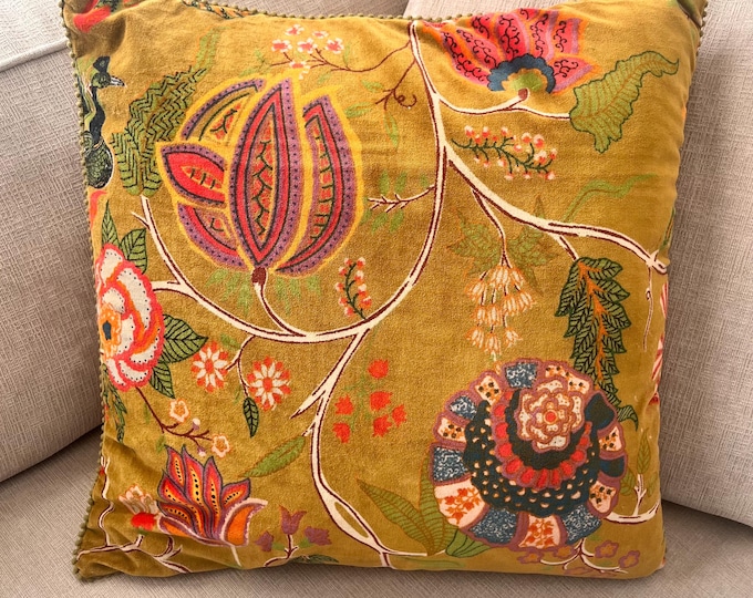 green velvet pillow with floral design motif 20” square