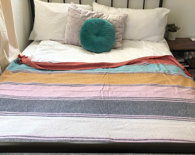 Multicolored woven cotton throw with fringe edging