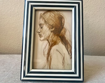 Vintage style striped frame. Stands vertically and horizontally