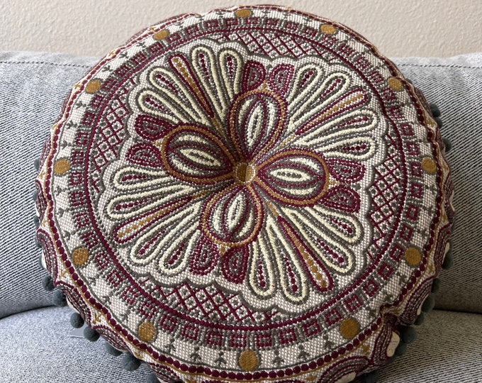 15” embroidered round  chambray pillow with Pom poms