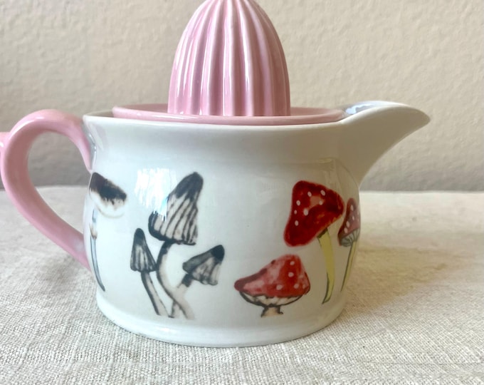 Pink and cream ceramic juicer and pitcher detailed with mushrooms,  22 oz.