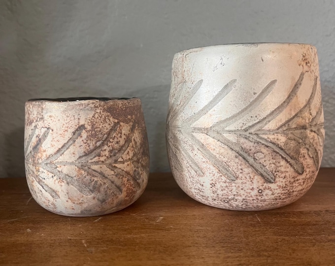 Pine leaf votive with a distressed mercury glass finish