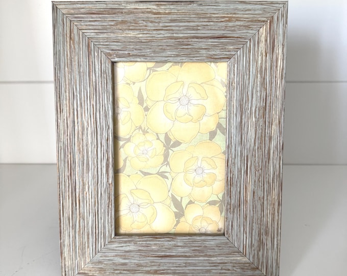 Vintage 7"x 9" gray wood frame holds a 4"x 6" image