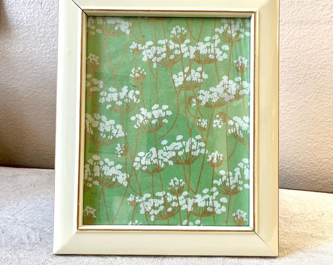 Vintage cream and gold style 12 1/2" x 10 1/2" frame with handmade paper holds a 7 3/4 x 9 3/4 image