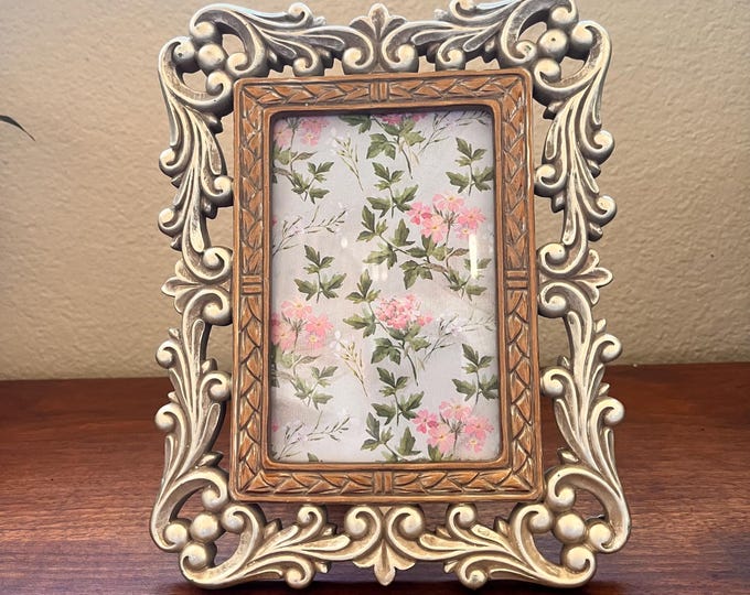 Vintage 9x7 silver wood frame with ornate detailed border holds a 3 1/2"x5 1/2" image