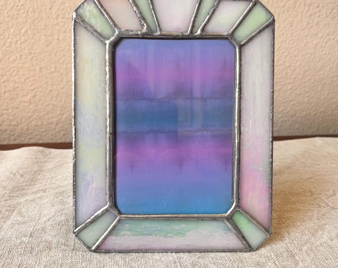 Vintage silver pink and blue stain glass frame 7 1/4 "x 5 1/2 "holds a 3 1/4" x 4 3/4" image.