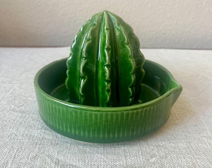 Green two-tone cactus shaped ceramic juicer 2” x 4”