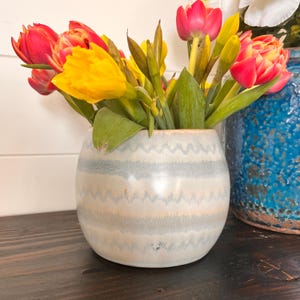 Blue, beige and white multi colored stripe planter 6”Dx 5 1/4" H . No drain holes