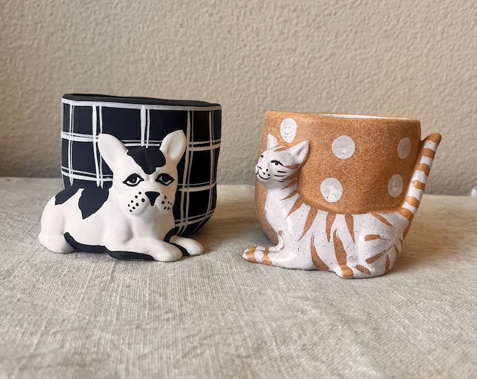 Cat and dog planter 4”W x 3 1/2"H . No drain hole sold separately