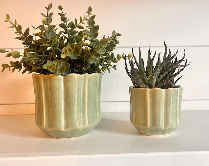 Fluted pale blue planter. Comes in two sizes