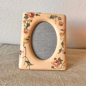 Vintage ornate oval frame 7&quot;x 5 1/2&quot; inch with rose details holds 4 3/4&quot;x 3 1/4&quot; inch image