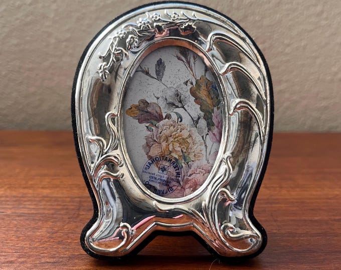 Vintage 4 1/2 x 3 1/2” ornate silver frame hold 1 3/4” x  2 3/4 " image