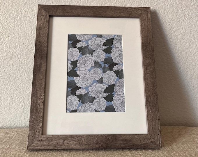 Rustic wood frame holds a 5x7 with matte or approximately a 7 1/2x 9 1/2 Inch image without matte