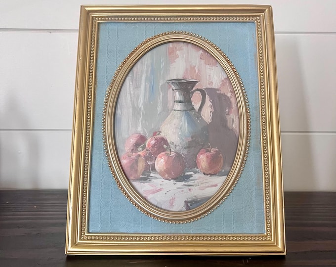 Victorian style blue and gold 9 1/2" x 7 3/4" photo frame with oval window hold a 4 3/4"x 6 1/2" image