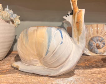 Ceramic snail shaped planter/vase, reactive glaze, multi color blue gray tones. Each one will slightly vary.  7"L x 4"W x 6-1/4"H