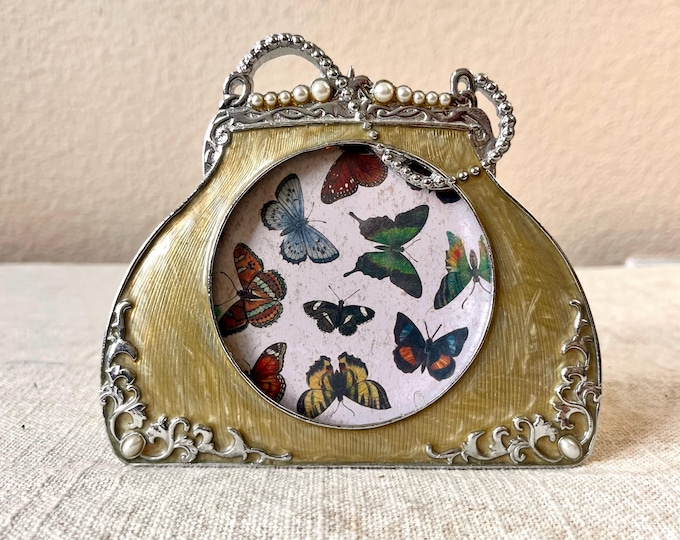 Vintage yellow and silver purse frame with rhinestone and pearl details 5"Wx 4 1/2" h holds a 2 3/4 " photo. Stand only