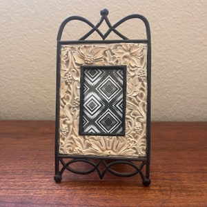 Vintage 3 1/2 &quot; x 6 1 /2&quot; metal frame with flower detail holds a 1 1/2&quot;x 2 1/2&quot; image