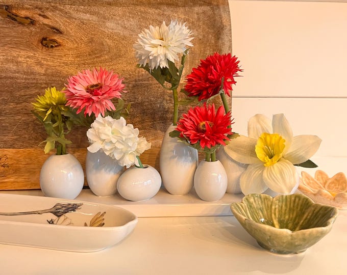 white egg ceramic vase with 7 openings