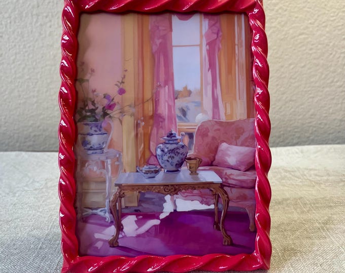 Vintage style hot pink 7 1/2”x 5 1/2” resin frame holds a 6 1/2”x 4 1/2” photo
