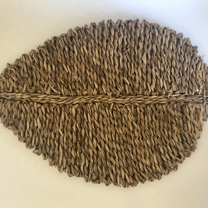 Leaf Shaped rattan placemat 20”x 14”