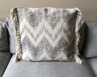 20” stonewashed cotton slub pillow with chevron print and tassels