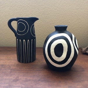 Handmade terra cotta vase with circles black and white