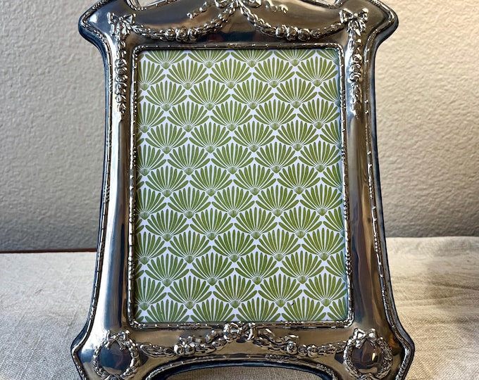Vintage 10"x 8" inch silver frame with floral detail holds approximately a 5x7 image