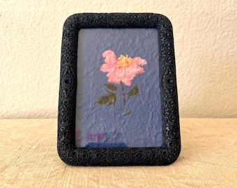Vintage style navy blue 4 1/2 x 6 inch frame holds a 3 1/2 x 5 inch image