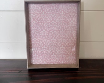 Rustic wood frame holds a 8x10 image.