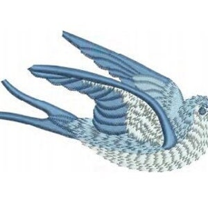 May include: A blue and white embroidered bird with a long tail and wings spread out in flight.