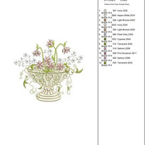 May include: Embroidered design of a white urn with pink flowers and green leaves. The design is called 'Flower Urn' and is digitized by Sue Box. The design is available in two sizes: small (7.54 cm x 6.82 cm) and large (9.78 cm x 8.86 cm).
