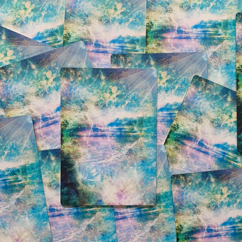 May include: A collage of abstract art featuring a blue, green, and purple color scheme. The artwork has a dreamy, ethereal feel with a focus on a swirling, cloudy sky and a distant shoreline.