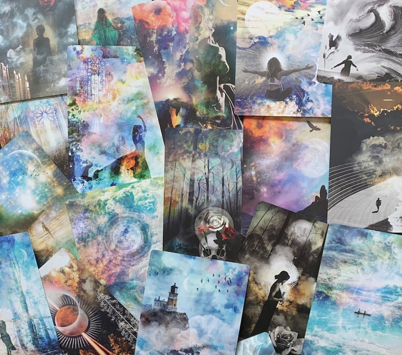 May include: A collection of colorful tarot cards with various images, including a forest, a woman with outstretched arms, a lighthouse, and a celestial scene. The cards are arranged in a random pattern, creating a visually appealing and mystical aesthetic.